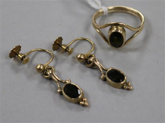 A 9ct gold and gem set ring and a pair of similar earrings.